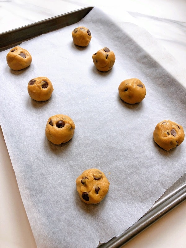 rolled Peanut Butter Chocolate Chip Cookies on baking tray