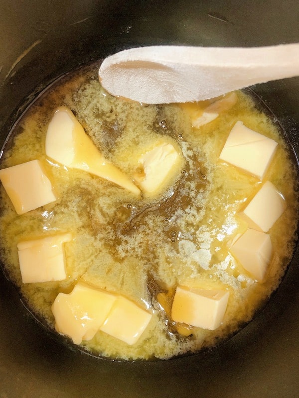Melting butter and syrup for Anzac biscuits. 