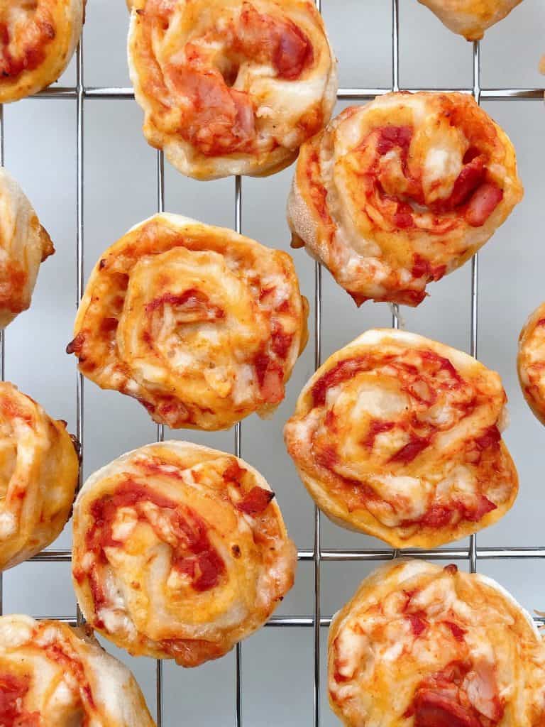 Pizza scrolls on cooling rack
