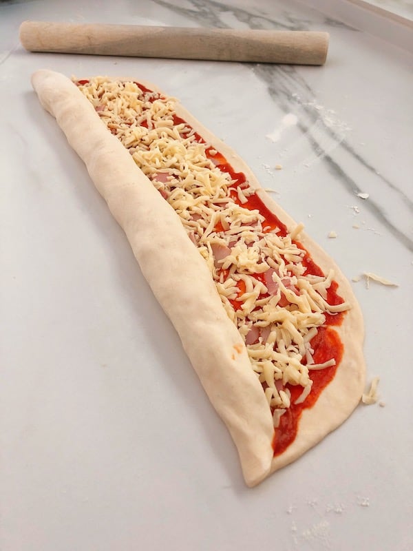 Rolling pizza scrolls