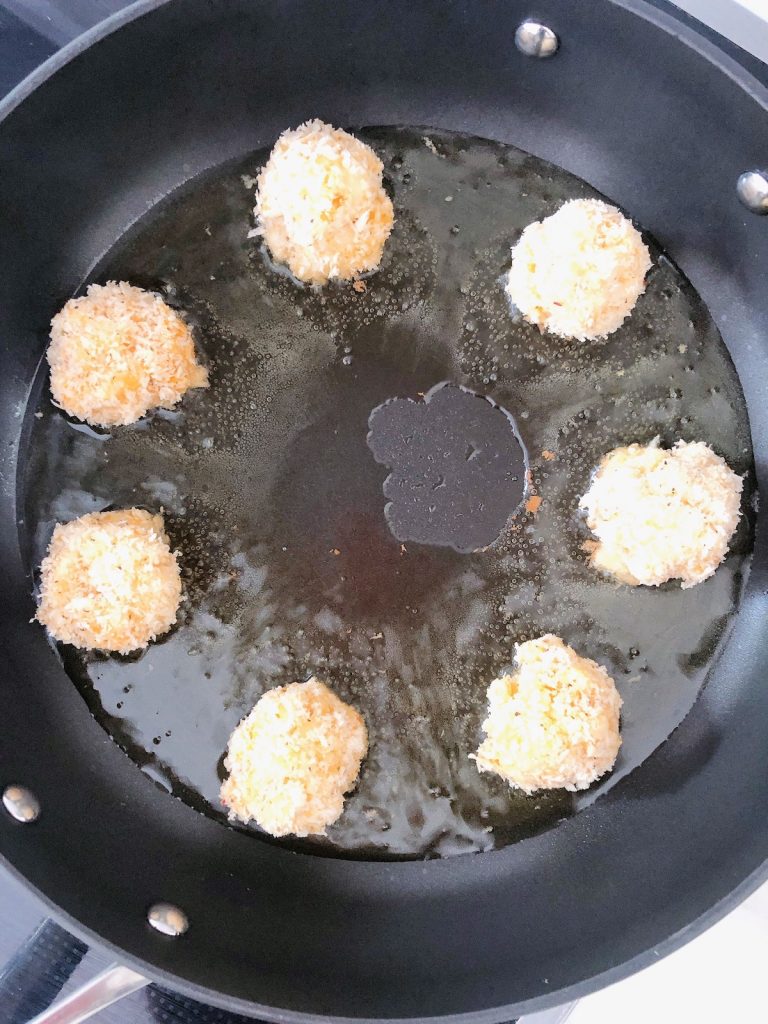 Fried mac n cheese balls in skillet