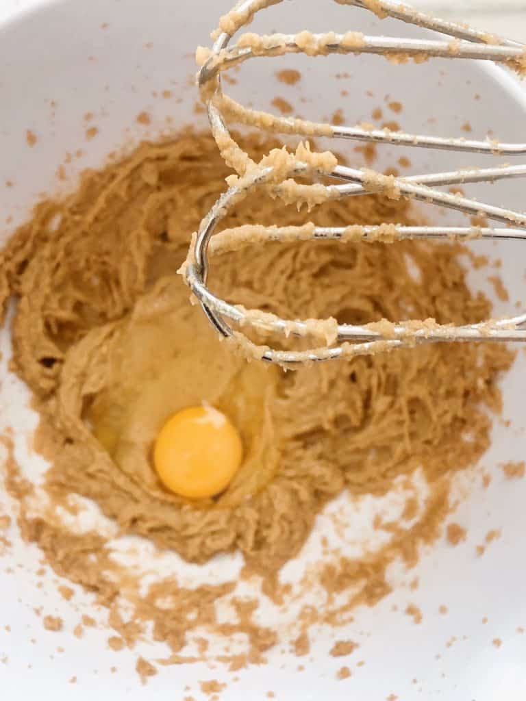 Adding eggs to abc muffin mixture