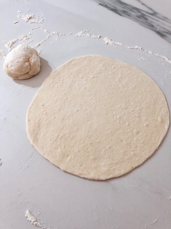 Floured Pita bread dough.