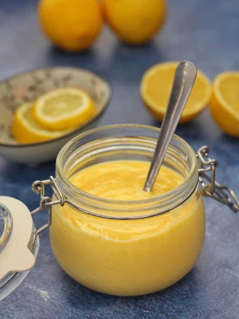 Jar of Thermomix lemon curd on table