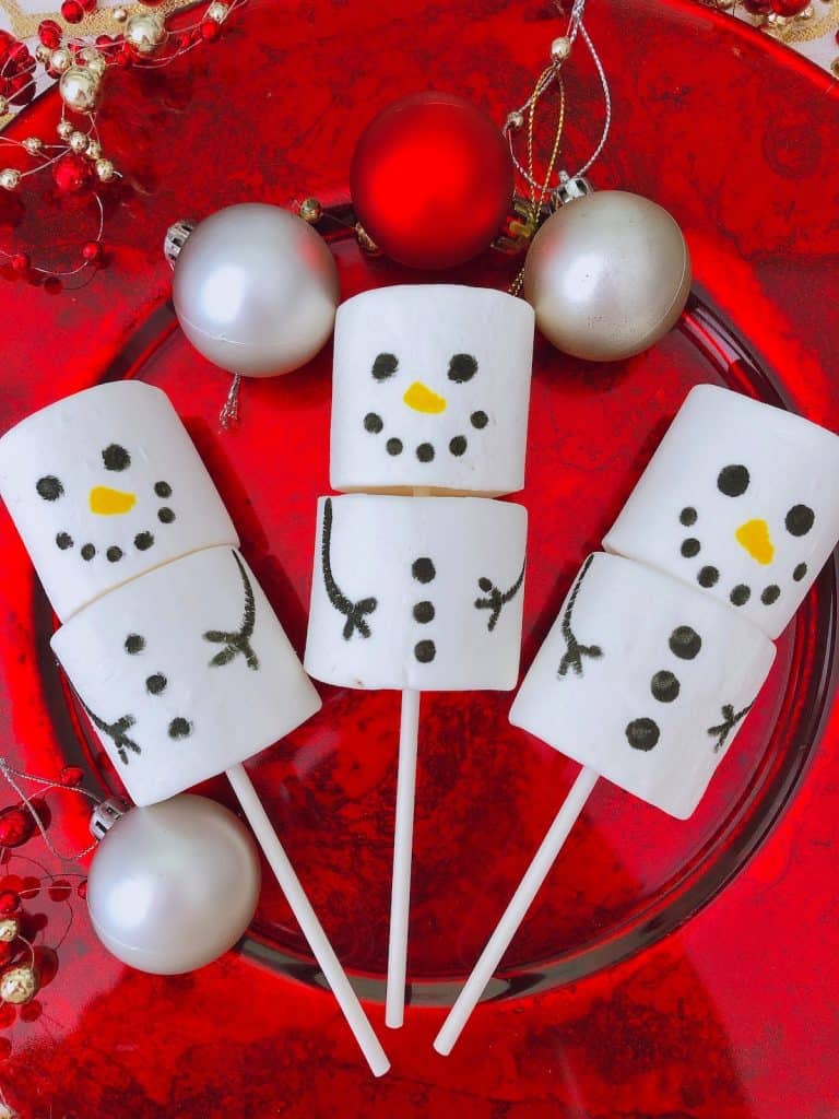 a plate of snow men Christmas marshmallow