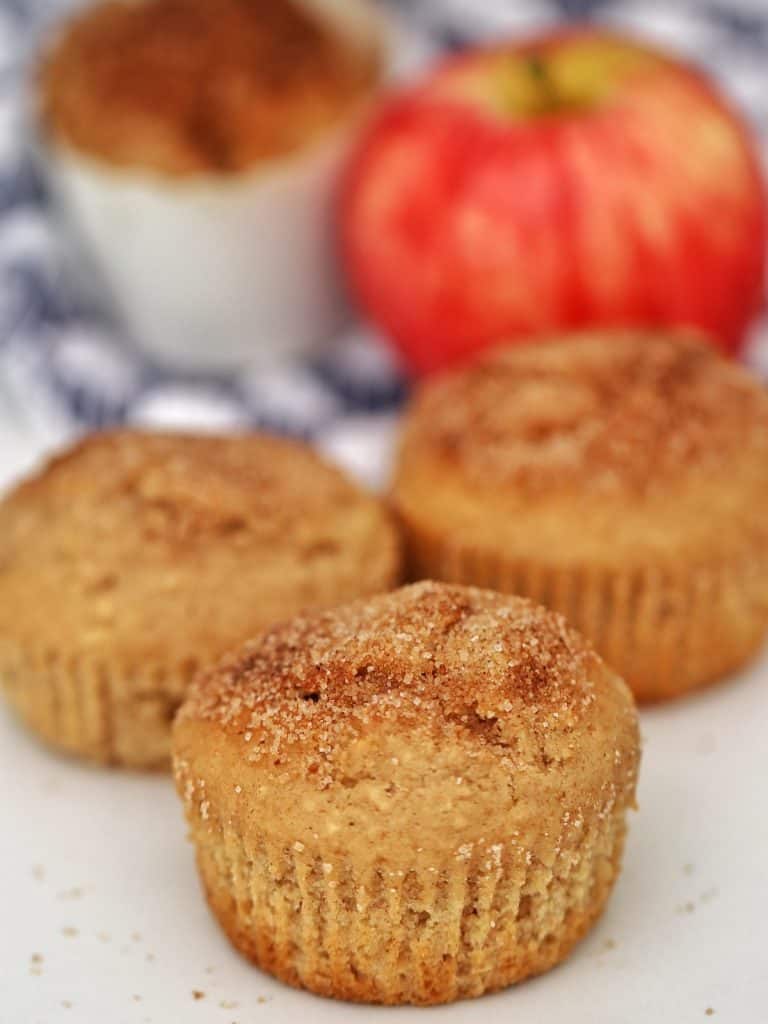 Apple cinnamon muffins on a table.