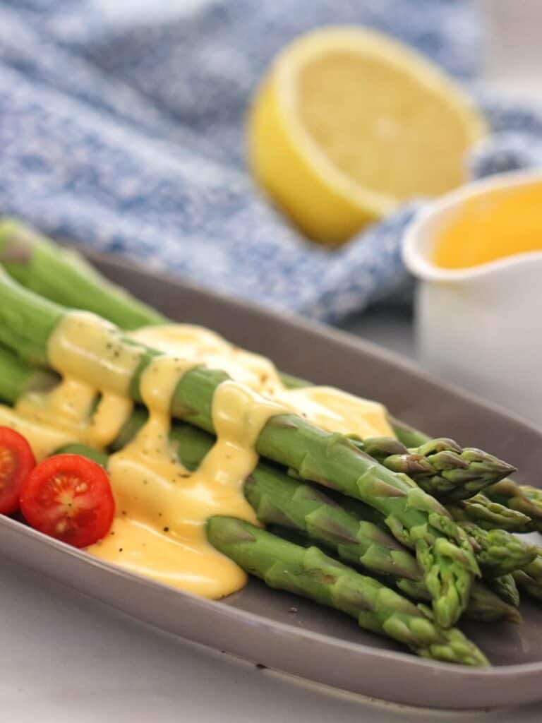 Asparagus with Hollandaise Sauce drizzled on top