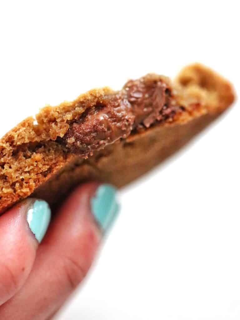 Nutella stuffed cookie close up to show gooey centre