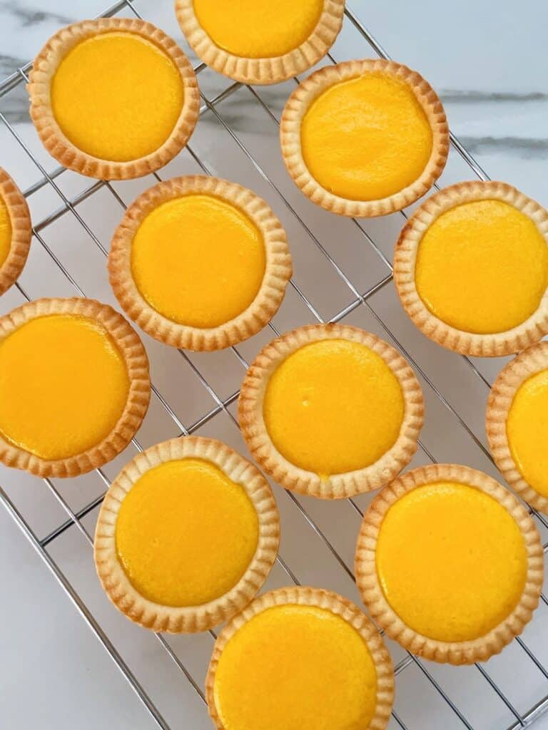 Thermomix passion fruit tarts cooling on wire rack