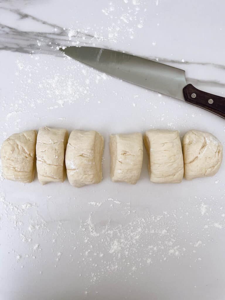 Naan Bread dough cuts with knife