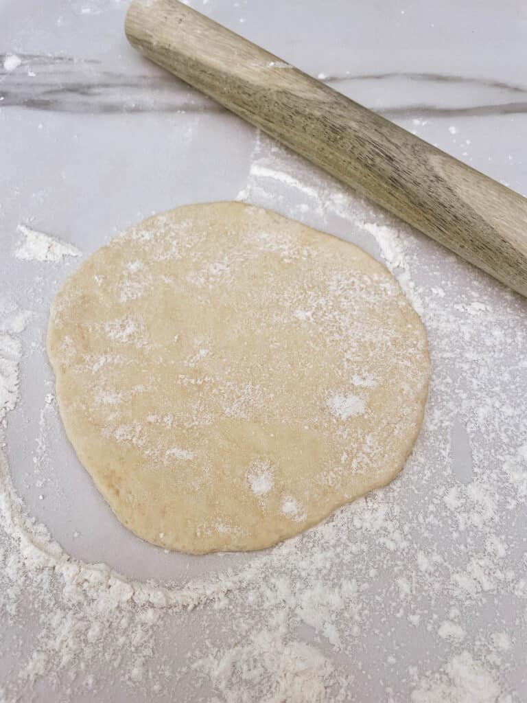 Naan bread dough rolled out