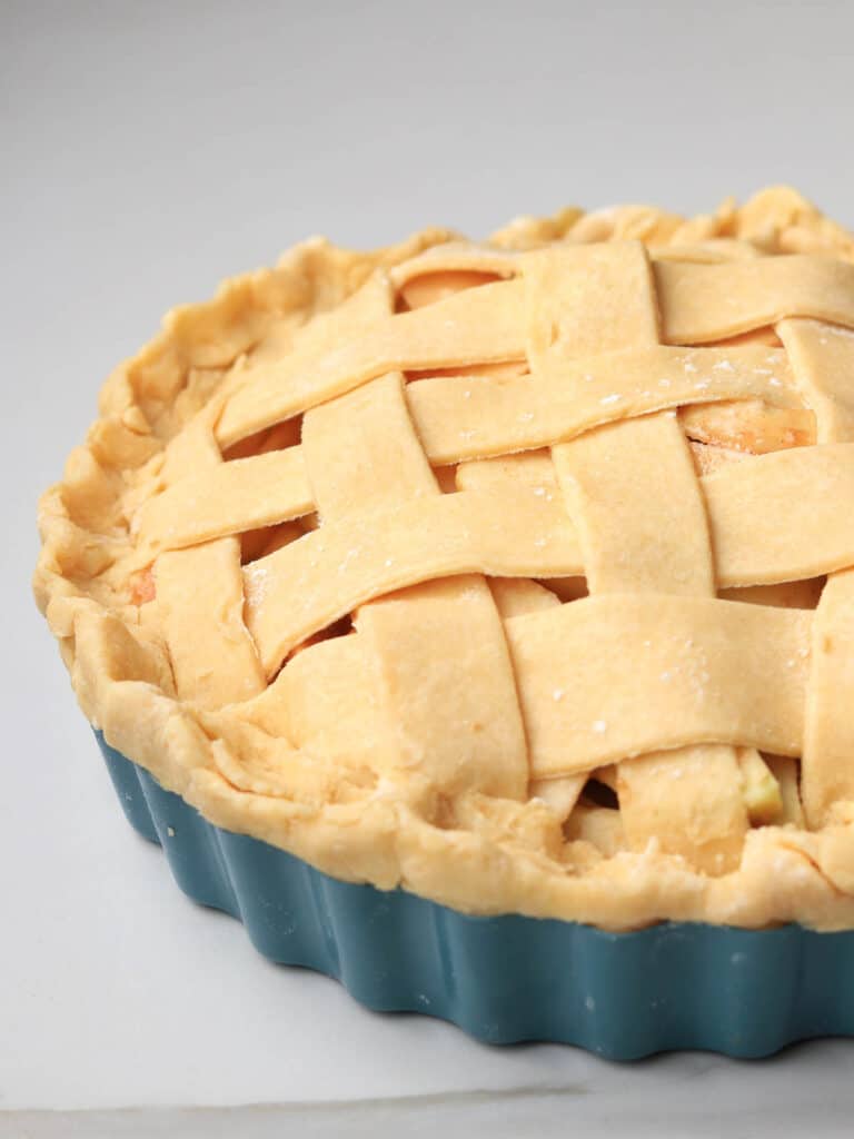 Close up of apple pie with lattice pastry top