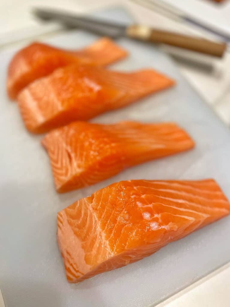 a row of fresh salmon meat