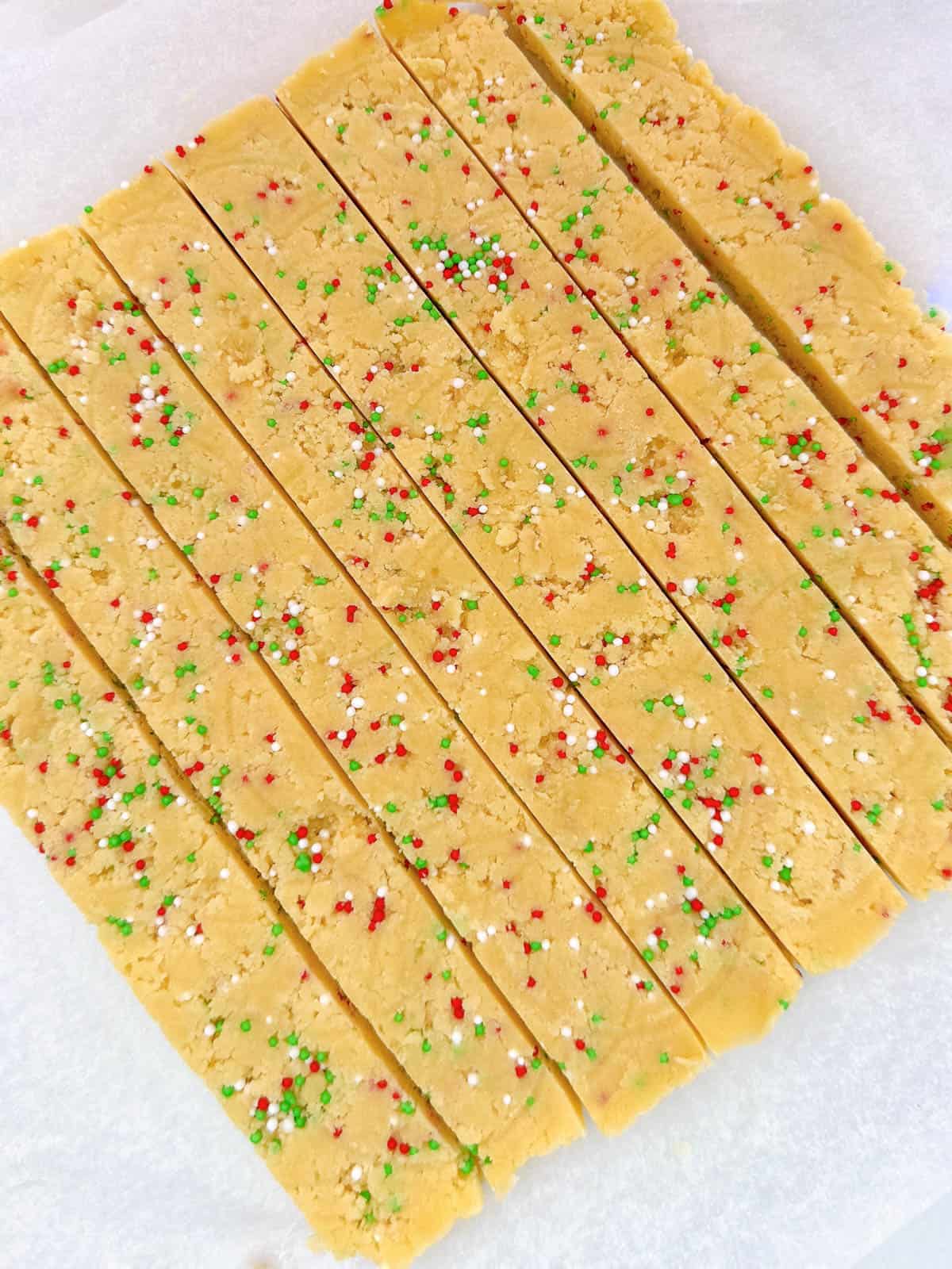 Thermomix Christmas Shortbread Bites dough cut into slices. 