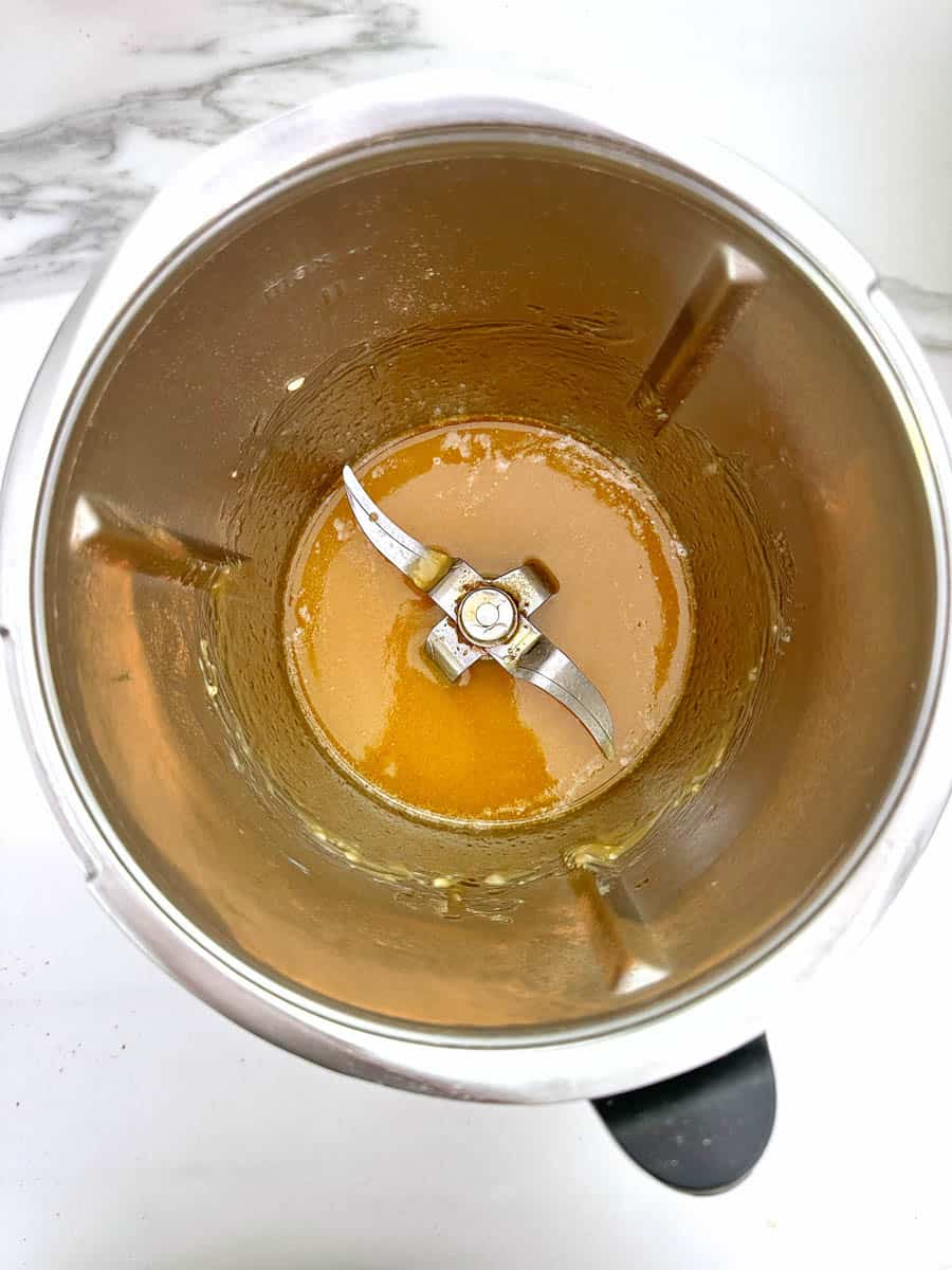 Melted butter and golden syrup in Thermomix bowl.