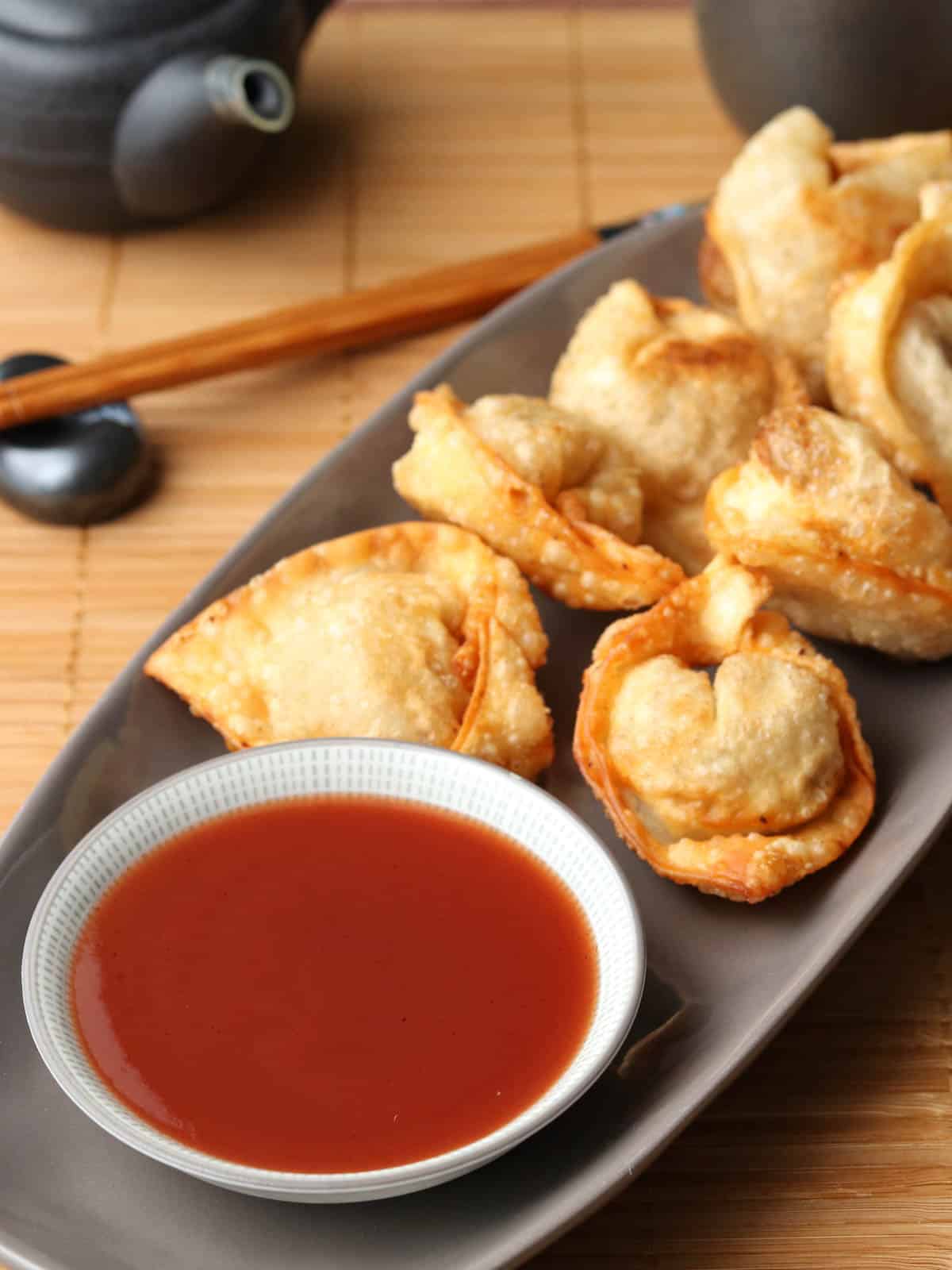 Crispy wontons on a plate.