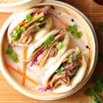 Pork Bao Buns in steamer basket.