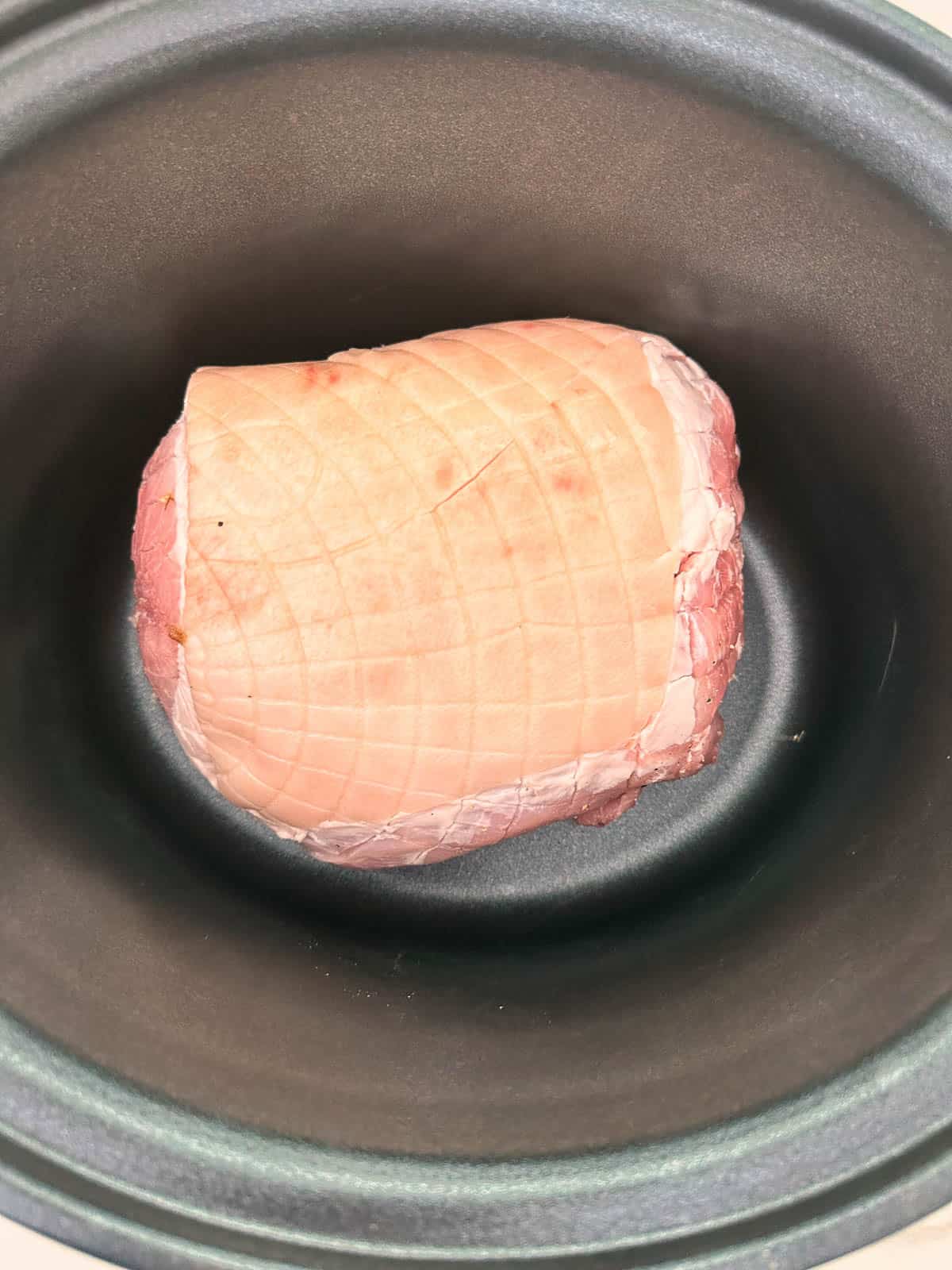 Pork shoulder in slow cooker.