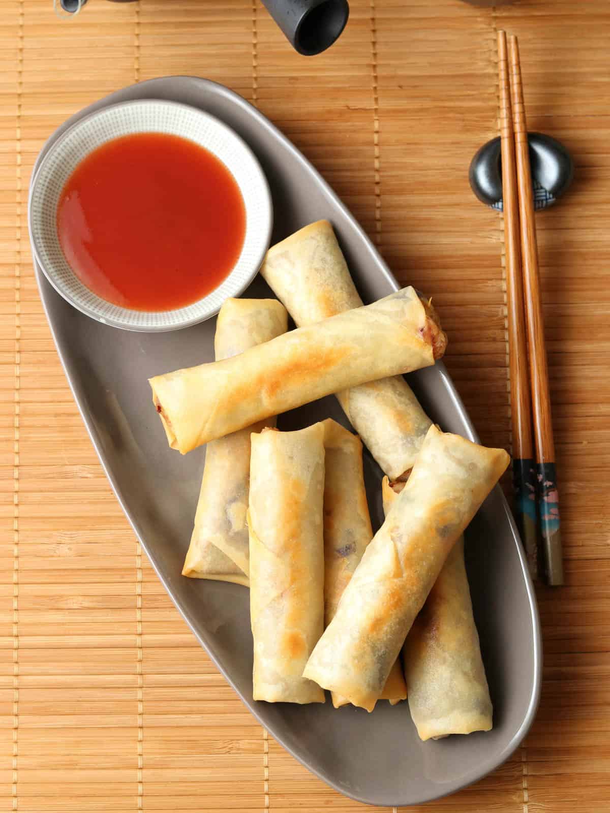 Spring rolls served on a plate. 