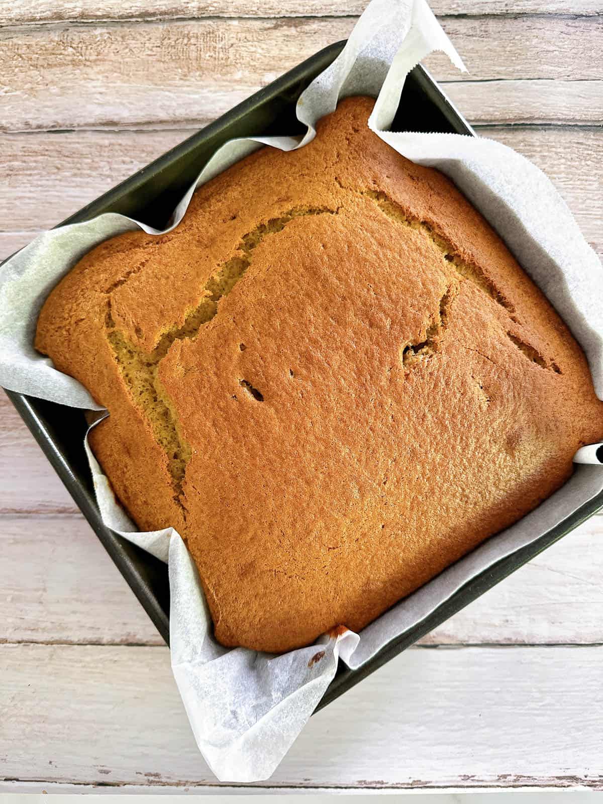 Thermomix banana cake in a tin fresh from the oven.