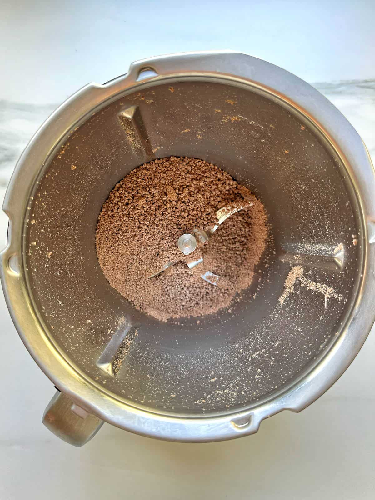 Grated Chocolate in Thermomix bowl.