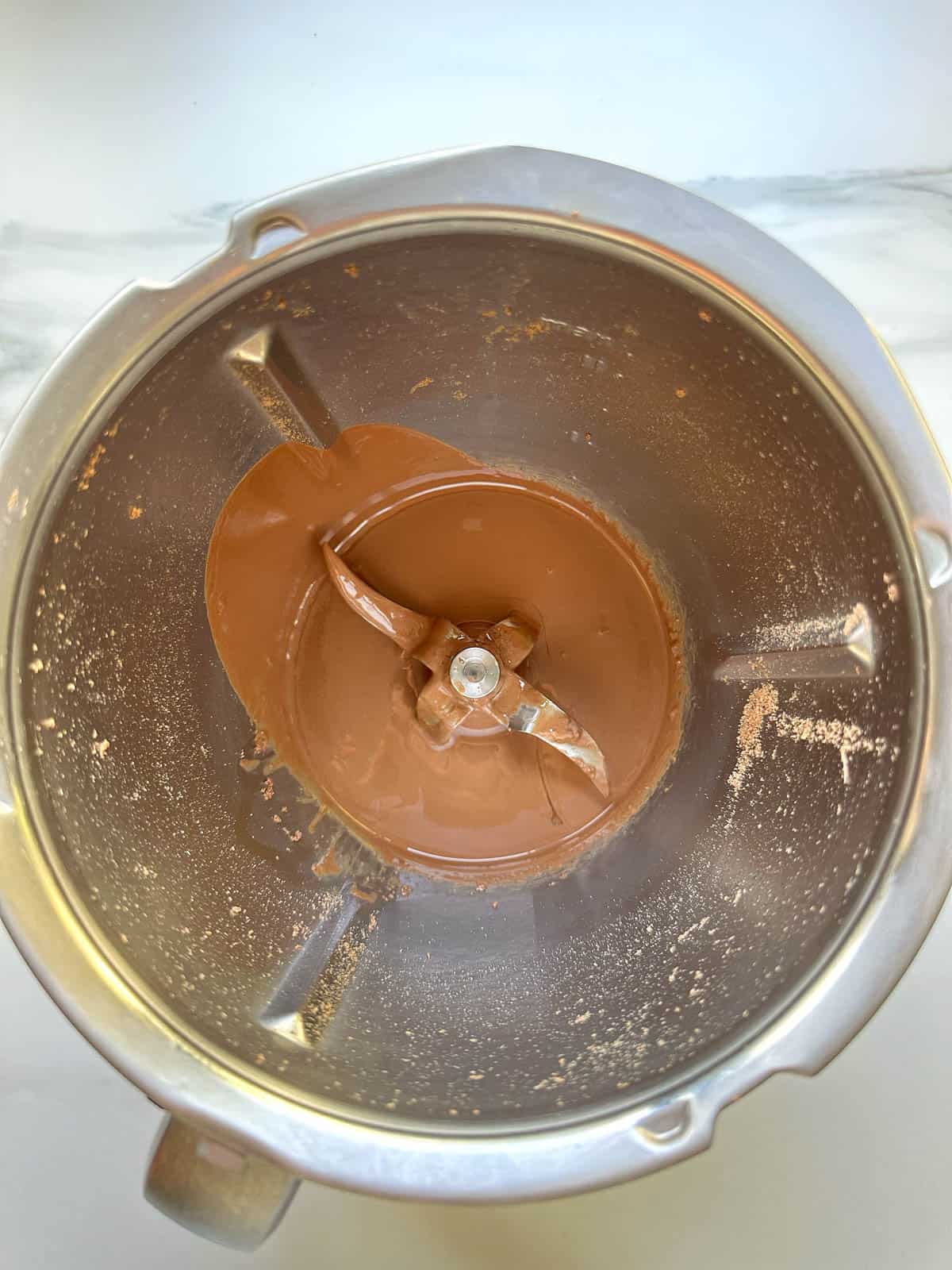 Melted Chocolate in Thermomix bowl.