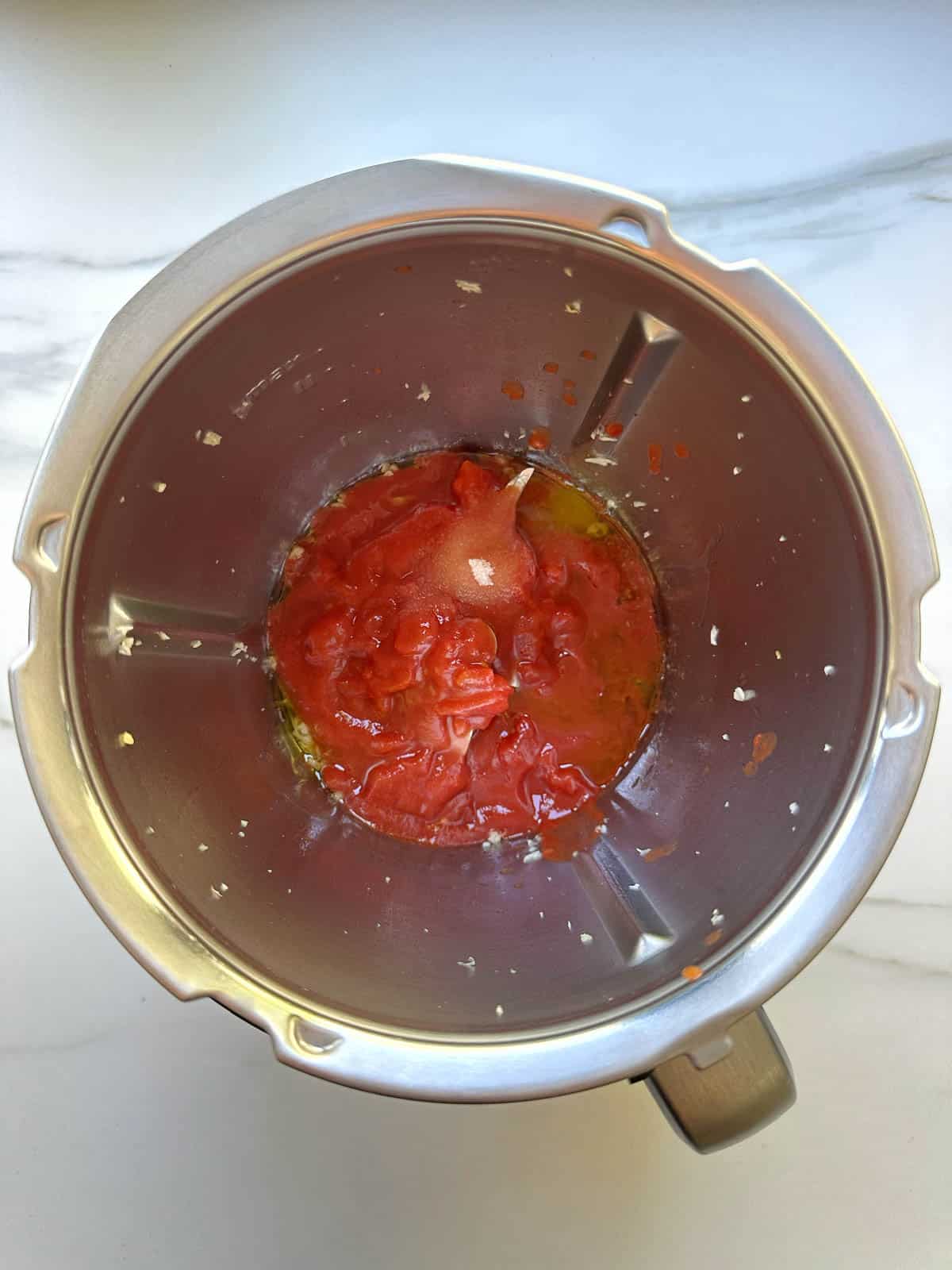 Napolitana sauce ingredients in Thermomix bowl.