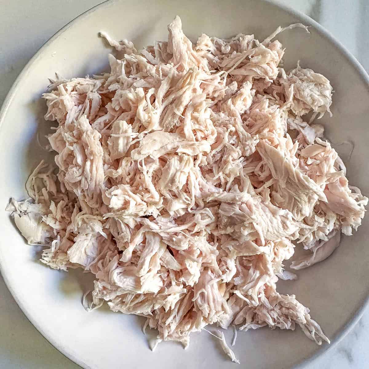 Thermomix Shredded Chicken in a bowl.