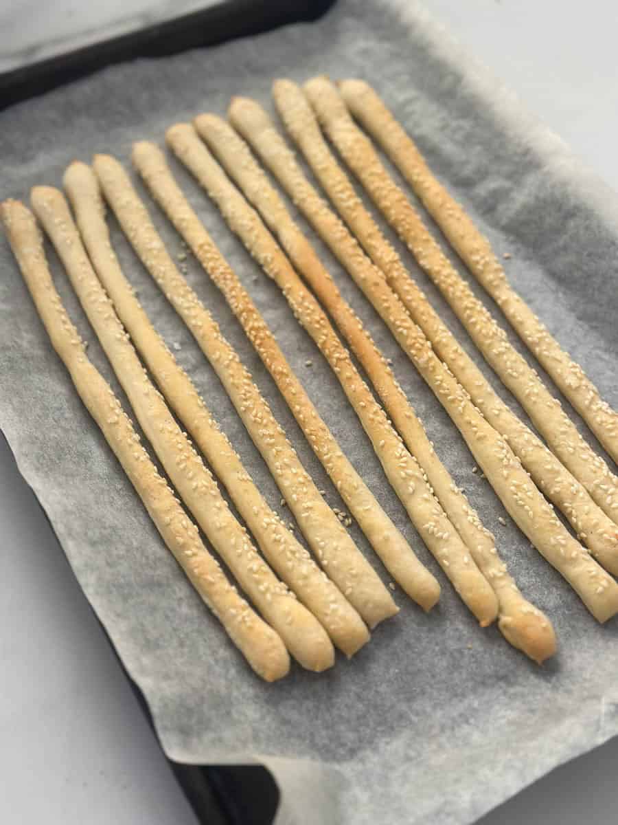 Baked grissini on a baking sheet. 