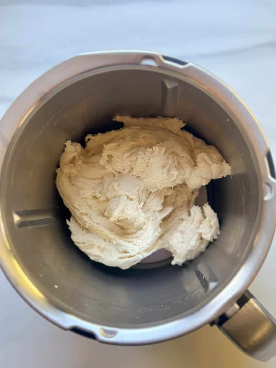 Dough for homemade Thermomix Grissini in the Thermomix bowl. 