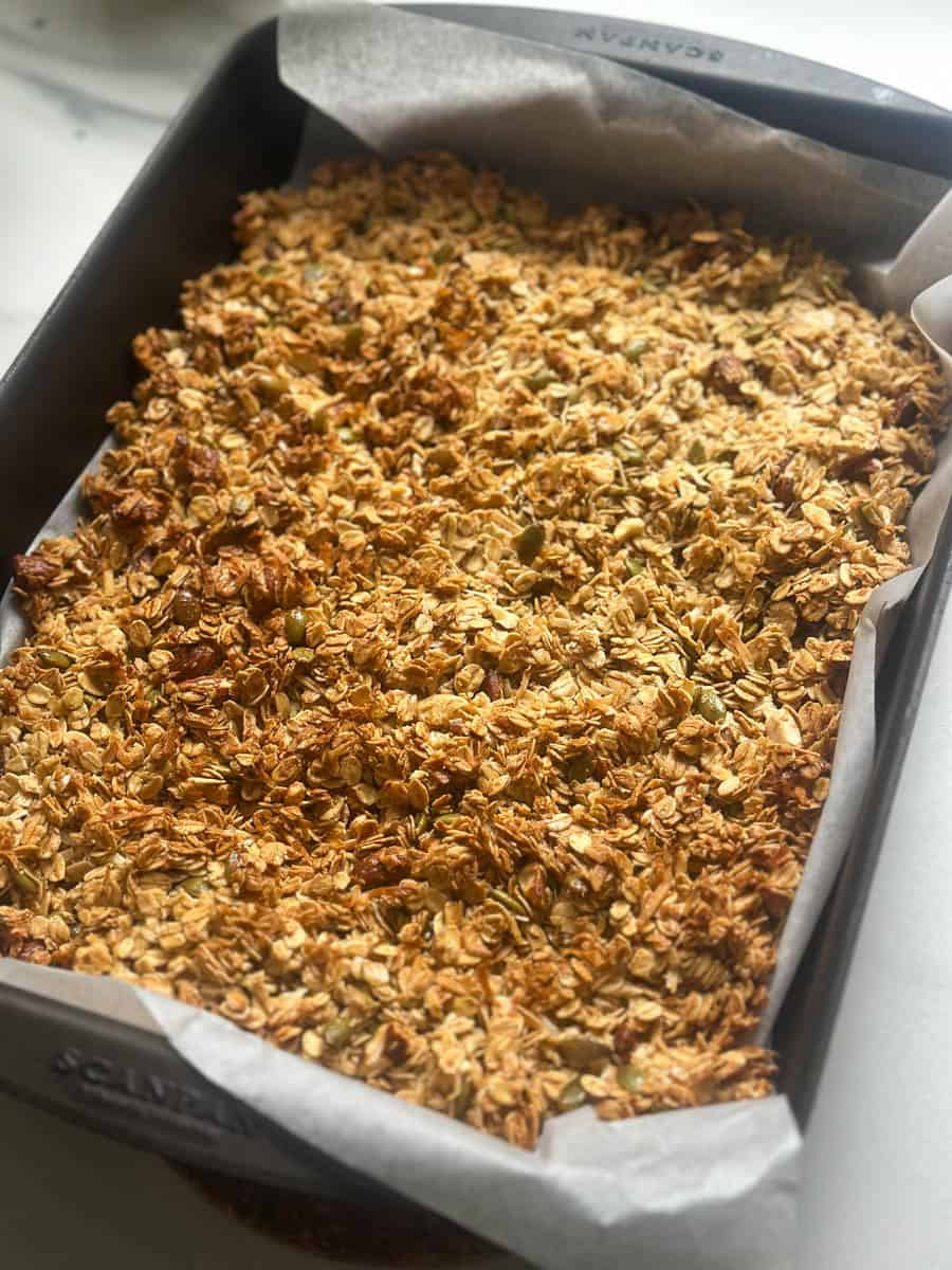 Baked Granola in a baking tray.