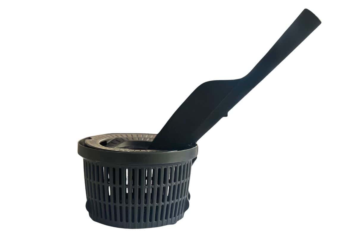 Thermomix simmering basket using spatula as handle.