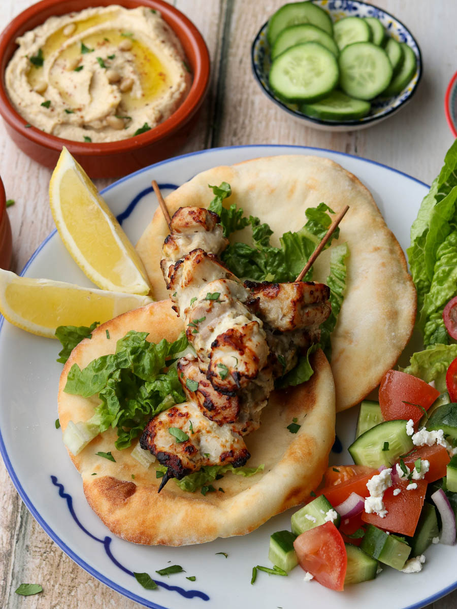Air fryer Chicken Souvlaki served with flatbread and salad. 