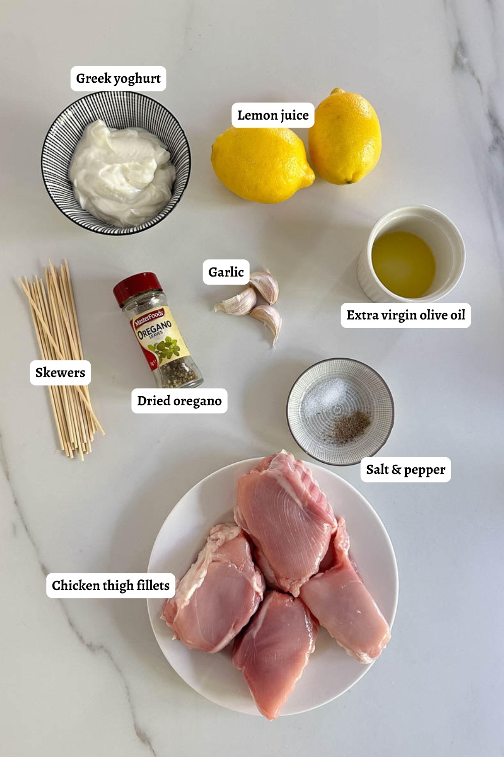 Flat lay of labelled ingredients for Air fryer Chicken Souvlaki.