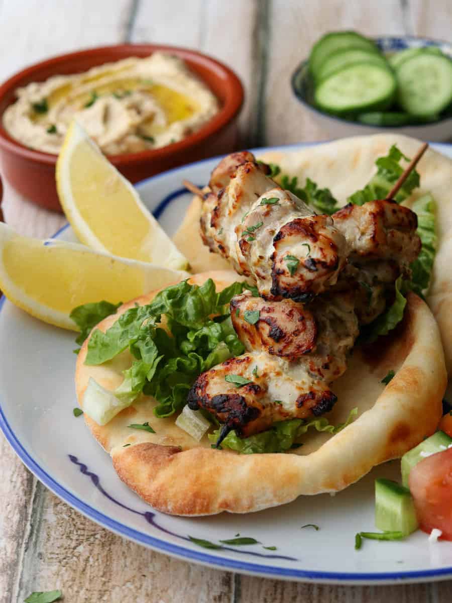 Air fryer flatbreads served with Chicken Souvlaki.
