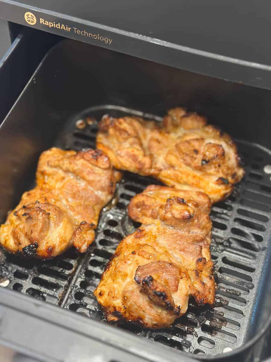 Vietnamese Air Fryer Lemongrass Chicken cooking in the air fryer.