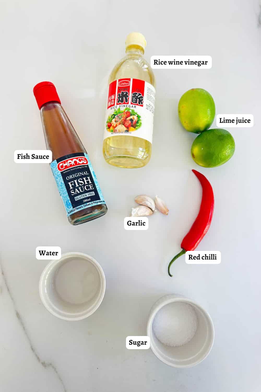 Labelled flat lay of Nuoc Cham dressing ingredients.