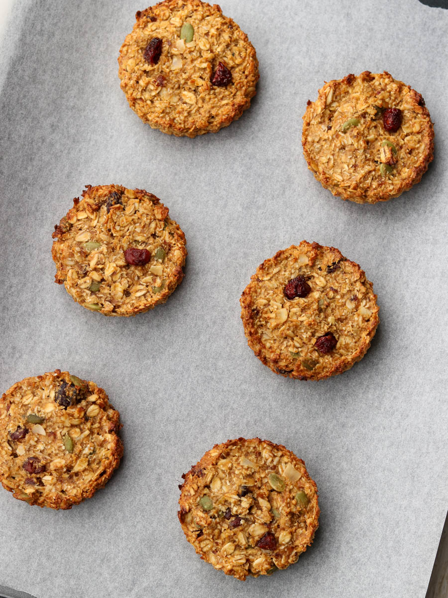 Thermomix breakfast cookies on a baking tray, fresh from the oven.